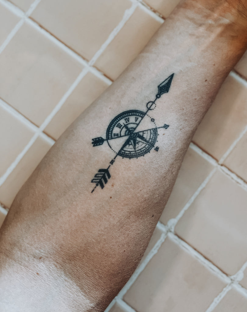 Tattoo uploaded by Edickson Camacaro II • Simple Tattoo (arrow and compass)  • Tattoodo